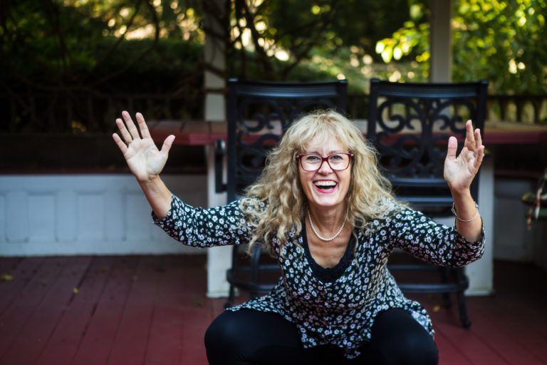 Debra Pascali-Bonaro, DONA Birth Doula Trainer squatting in a great birth position!